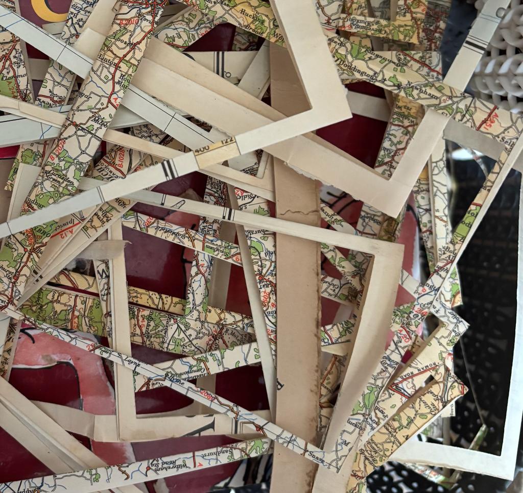 Map-covered frame offcuts in the Pixies & Sprites workshop
